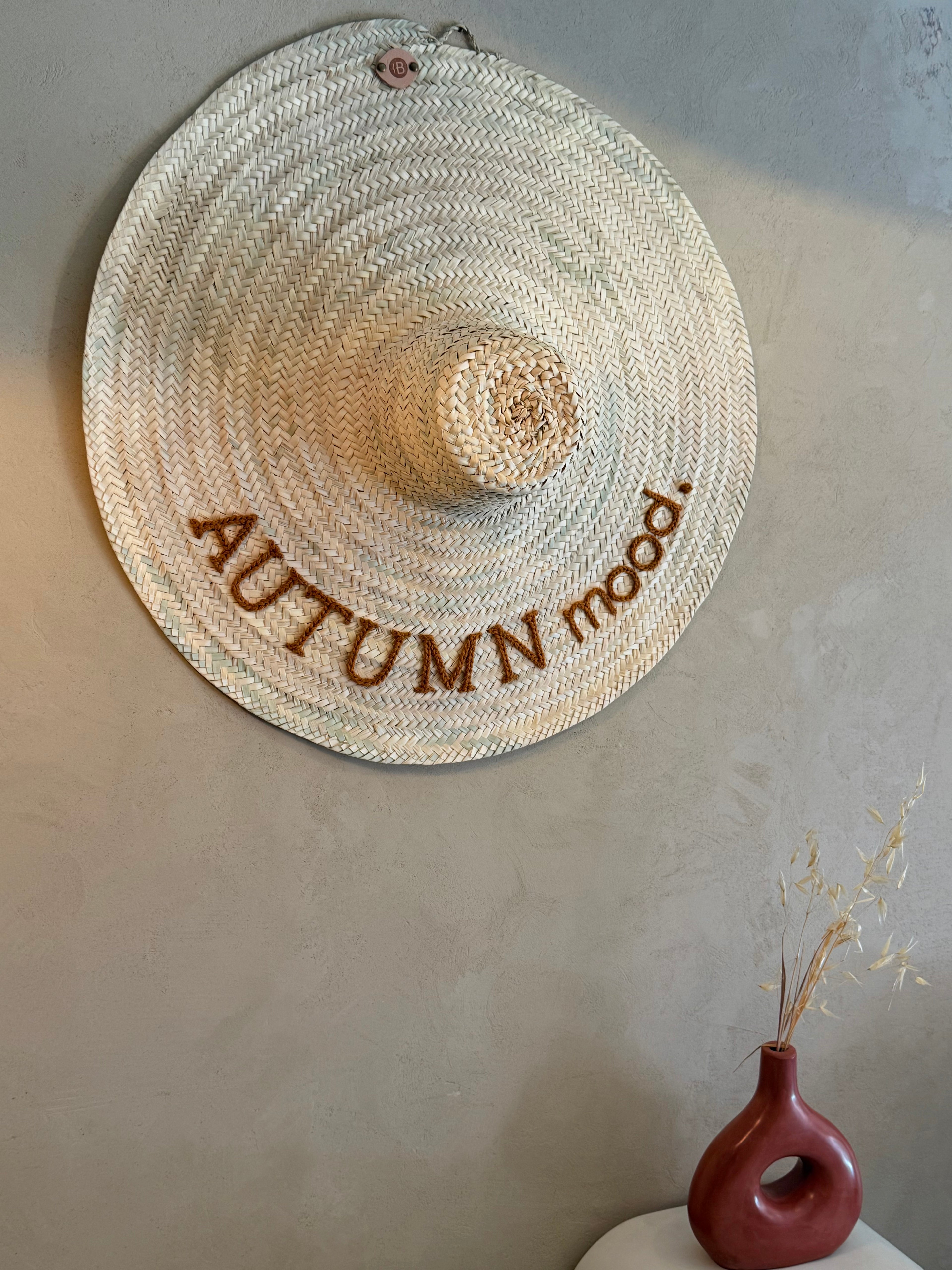 Straw hat with raffia fringe, hand-embroidered — Moroccan artisan wall decor